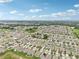 Expansive aerial shot displaying the community's residential density, landscaping, and overall layout at 10233 Opaline Sky Pl, Riverview, FL 33578