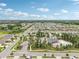 This aerial view displays the community's layout with its parks, homes, and extensive landscaping at 10233 Opaline Sky Pl, Riverview, FL 33578