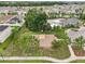 Aerial view of a well-maintained community basketball court near a pool and clubhouse at 10233 Opaline Sky Pl, Riverview, FL 33578