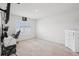Bright bedroom with neutral carpet, white walls, and a large window with shutters at 10233 Opaline Sky Pl, Riverview, FL 33578