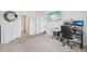 Spacious bedroom featuring a TV and carpet flooring, perfect for relaxation and entertainment at 10233 Opaline Sky Pl, Riverview, FL 33578
