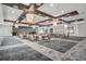 Large event space with elegant chandeliers, neutral decor, and flexible seating arrangements at 10381 Tupper Cay Dr, San Antonio, FL 33576