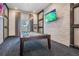 Billiards room featuring a pool table, TV, neutral paint, and natural light at 10381 Tupper Cay Dr, San Antonio, FL 33576