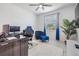 Cozy home office with a gaming chair, and ample desk space for optimal productivity at 10381 Tupper Cay Dr, San Antonio, FL 33576