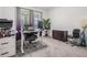 Comfortable home office space featuring a modern desk setup, ergonomic chair, and natural light at 10381 Tupper Cay Dr, San Antonio, FL 33576