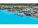 Beautiful lagoon featuring lounge seating, cabanas, and shallow beach entry for Gathering fun at 10381 Tupper Cay Dr, San Antonio, FL 33576