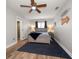 Charming bedroom with beach decor, ceiling fan and ample natural light at 10875 131St St, Largo, FL 33774
