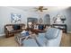 Comfortable living room with leather sofas and coastal-themed decor at 10875 131St St, Largo, FL 33774