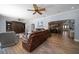 A spacious living room with open access to the dining area at 10875 131St St, Largo, FL 33774