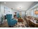 Stylish living room featuring an open layout, with hardwood floors, and comfortable seating at 10875 131St St, Largo, FL 33774
