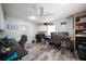 Bright office space with wood floors, drop lighting, multiple work stations and ergonomic chairs at 10875 131St St, Largo, FL 33774