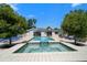 Backyard pool with spa, poolside patio, and exterior view of the well-maintained home at 10875 131St St, Largo, FL 33774