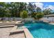 Backyard pool with spa and landscaped area with waterfall at 10875 131St St, Largo, FL 33774
