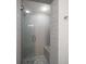 Modern shower features sleek subway tile and a glass door at 10875 131St St, Largo, FL 33774