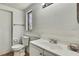 Bathroom featuring modern fixtures, a toilet, vanity, sink and a shower-tub combo at 11130 White Oak Ln, Port Richey, FL 34668