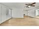 The living room has an open floor plan and modern ceiling fan at 11130 White Oak Ln, Port Richey, FL 34668