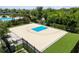 Community basketball court featuring modern flooring and well-kept landscaping at 11522 Sunburst Marble Rd, Riverview, FL 33579