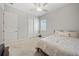 Bedroom including a window, ceiling fan and closet at 11522 Sunburst Marble Rd, Riverview, FL 33579