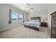 Bright bedroom with large windows, plush carpeting, and comfortable furnishings for a relaxing retreat at 11522 Sunburst Marble Rd, Riverview, FL 33579