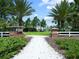 Inviting community park entrance with lush greenery and manicured landscaping at 11522 Sunburst Marble Rd, Riverview, FL 33579