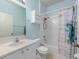 Clean bathroom features a shower-tub combination and contemporary fixtures at 11559 Captiva Kay Dr, Riverview, FL 33569