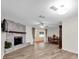 Spacious living room with fireplace flowing into the dining area, perfect for Gathering gatherings at 12946 116Th St, Largo, FL 33778
