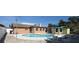 Inviting backyard with an in-ground pool, outdoor seating, and a relaxing atmosphere for leisure at 12946 116Th St, Largo, FL 33778
