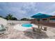 This photo shows the pool with a patio and lounge chairs at 12946 116Th St, Largo, FL 33778