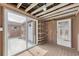 Empty room with sliding glass door to the exterior and wired shelving at 12946 116Th St, Largo, FL 33778