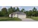 Charming one-story home featuring a two-car garage, landscaped front yard, and neutral-colored exterior at 13126 Empress Jewel Trl, Parrish, FL 34219