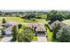 Beautiful single-story home on a well-maintained lawn, near a greenbelt and pond at 13238 Chipout Ln, Hudson, FL 34669