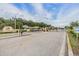 Welcoming gated community entrance under a bright sky, offering security and exclusivity at 13238 Chipout Ln, Hudson, FL 34669