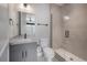 Modern bathroom featuring a sleek vanity, contemporary fixtures and glass-enclosed shower at 1330 W Gray St # 1, Tampa, FL 33606