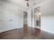 Bright bedroom with hardwood floors, ceiling fan, walk-in closet and en-suite bathroom at 1330 W Gray St # 1, Tampa, FL 33606