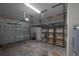 Spacious garage with overhead storage racks offers plenty of room for parking and organization at 1330 W Gray St # 1, Tampa, FL 33606