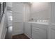 Conveniently located laundry room with modern washer and dryer at 1330 W Gray St # 1, Tampa, FL 33606