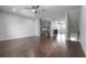 Expansive open-concept living room featuring modern finishes and sleek hardwood flooring at 1330 W Gray St # 1, Tampa, FL 33606