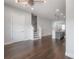 Spacious open-concept living room with hardwood floors and modern finishes at 1330 W Gray St # 1, Tampa, FL 33606