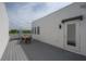 Spacious rooftop deck with outdoor table and chairs, ideal for dining and relaxing while enjoying the views at 1330 W Gray St # 1, Tampa, FL 33606