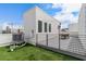 An inviting rooftop terrace featuring artificial grass, city skyline views, and outdoor relaxation space at 1330 W Gray St # 1, Tampa, FL 33606