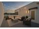 Cozy rooftop patio area featuring comfortable outdoor seating, string lights, and a peaceful ambiance at 1330 W Gray St # 1, Tampa, FL 33606