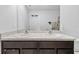 Bathroom features a double sink with granite counters and ample storage space at 13686 Whiskey Daisy Dr, Dade City, FL 33525