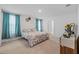 Comfortable bedroom with carpet flooring and calming neutral-colored walls at 13686 Whiskey Daisy Dr, Dade City, FL 33525