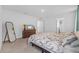 Comfortable bedroom with carpet flooring and calming neutral-colored walls at 13686 Whiskey Daisy Dr, Dade City, FL 33525
