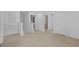 Spacious loft featuring views of a bathroom, bedroom and bonus room at 13686 Whiskey Daisy Dr, Dade City, FL 33525