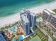 Coastal high-rise condo complex features amenities, beach access, and ocean views at 1520 Gulf Blvd # 1505, Clearwater Beach, FL 33767