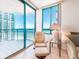 Relaxing chair and ottoman on a balcony with beach view and refreshing sea breezes at 1520 Gulf Blvd # 1505, Clearwater Beach, FL 33767