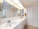 Bathroom featuring dual sinks, lots of counter space, and storage at 1520 Gulf Blvd # 1505, Clearwater Beach, FL 33767