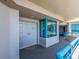 Condo entryway with covered walkway and views of the bay at 1520 Gulf Blvd # 1505, Clearwater Beach, FL 33767