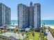 High-rise condo building with balcony views of the ocean and private beach access at 1520 Gulf Blvd # 1505, Clearwater Beach, FL 33767